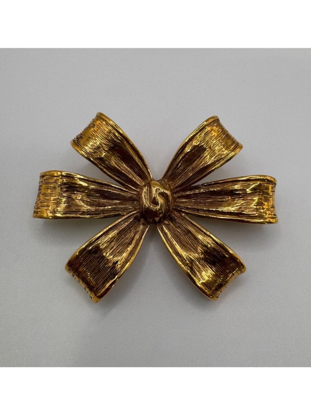 Signed Monet Gold Tone Textured Bow Brooch Dimensional Vintage Statement Pin